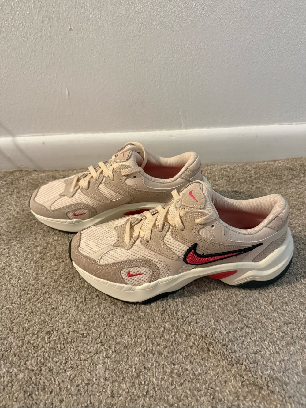 Nike Pink and Off White Athletic Shoes